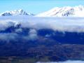 Au premier plan sous les nuage, le Plateau de Pellafol et au second plan de gauche à droite : Piquet de Nantes - Tabor, Grisonnière - Coiro